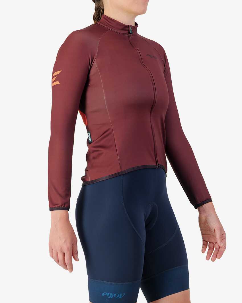 Side view of the women's thermal training long sleeve jersey in a mahogany colour way by Enjoy.cc